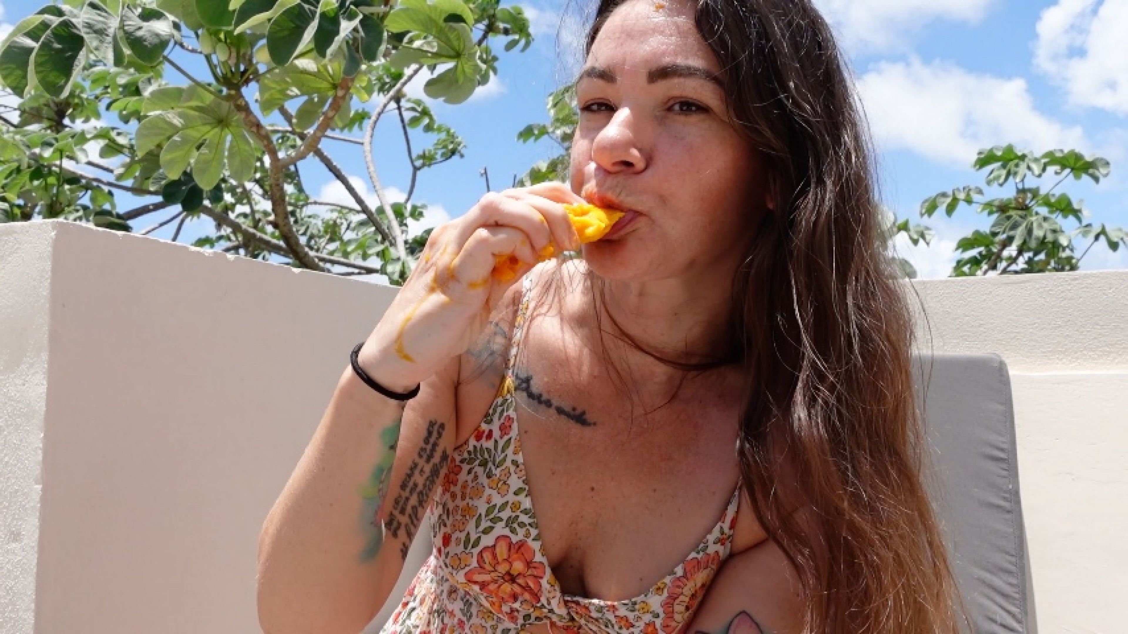 Peeling and eating a Mexican Mango SFW