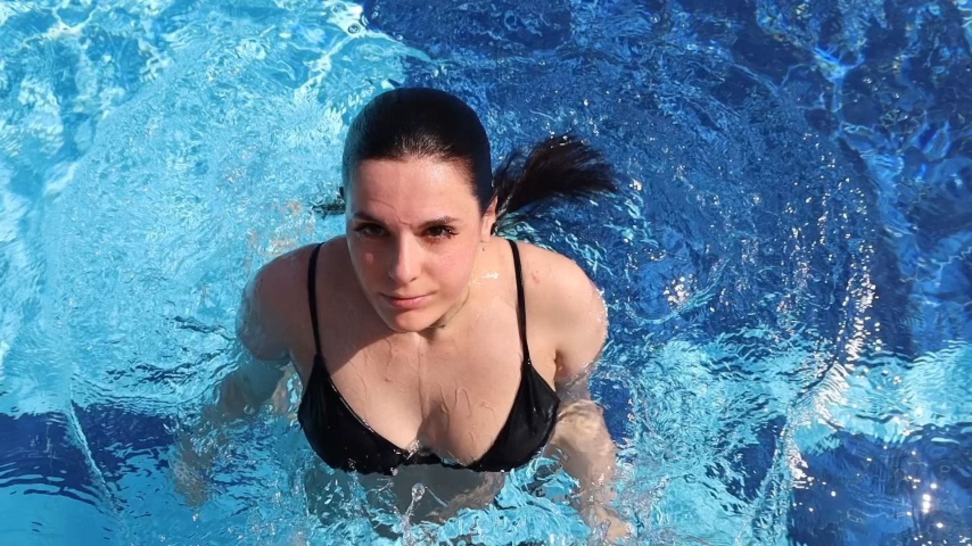 THE GODDESS SWIMS IN THE POOL AND RUNS ON THE BEACH