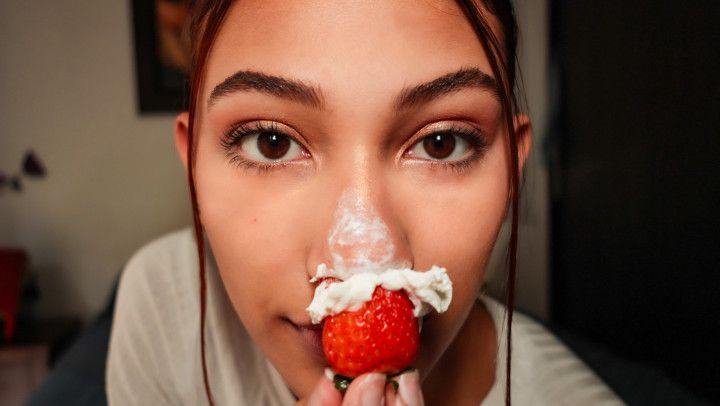 placing strawberries and cream on my nose