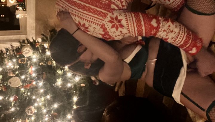 Fucking my dildo and sucking cock by the Christmas tree