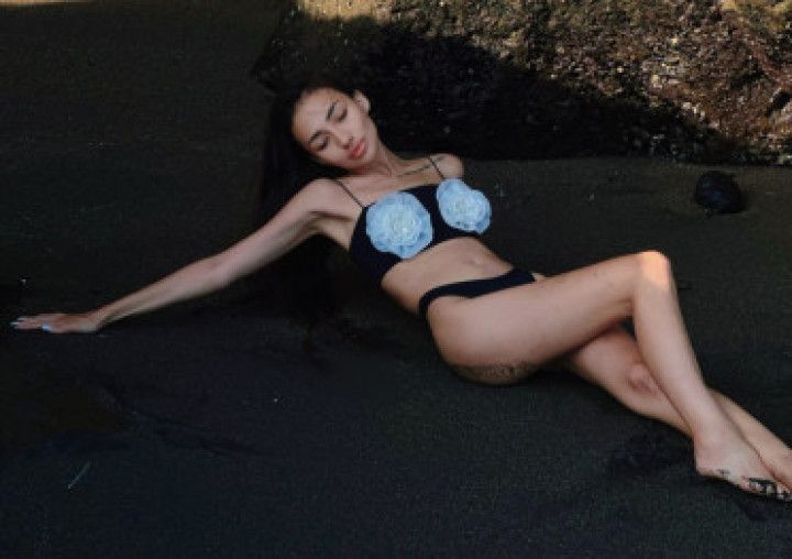 Slut sucking a dildo that is attached to a mirror