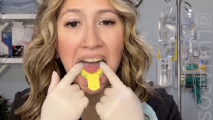 Dental Assistant takes teeth impressions on herself