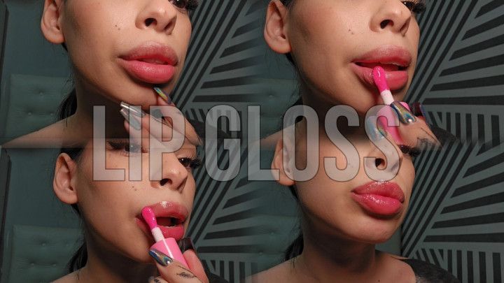 Painting my lips with gloss