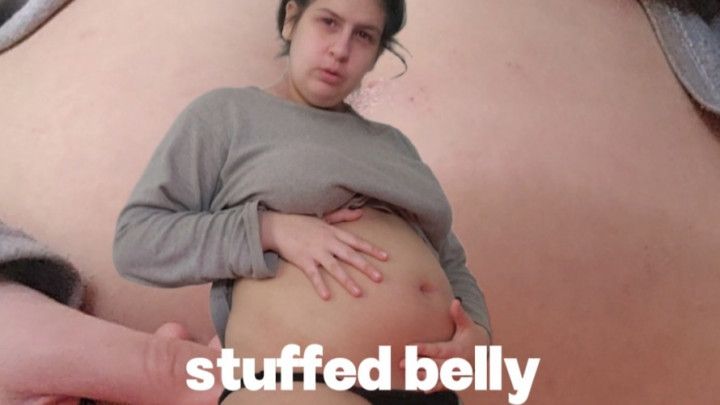 A chubby girl and her bloated belly