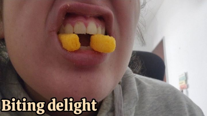 Chewing crunchy snacks close Up