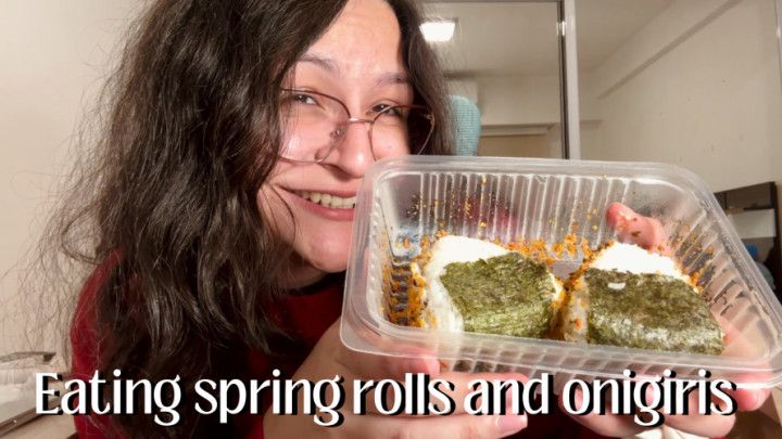 Eating spring rolls and onigiris
