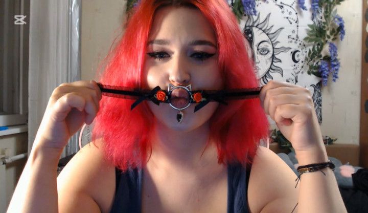 Trying on collars and chokers