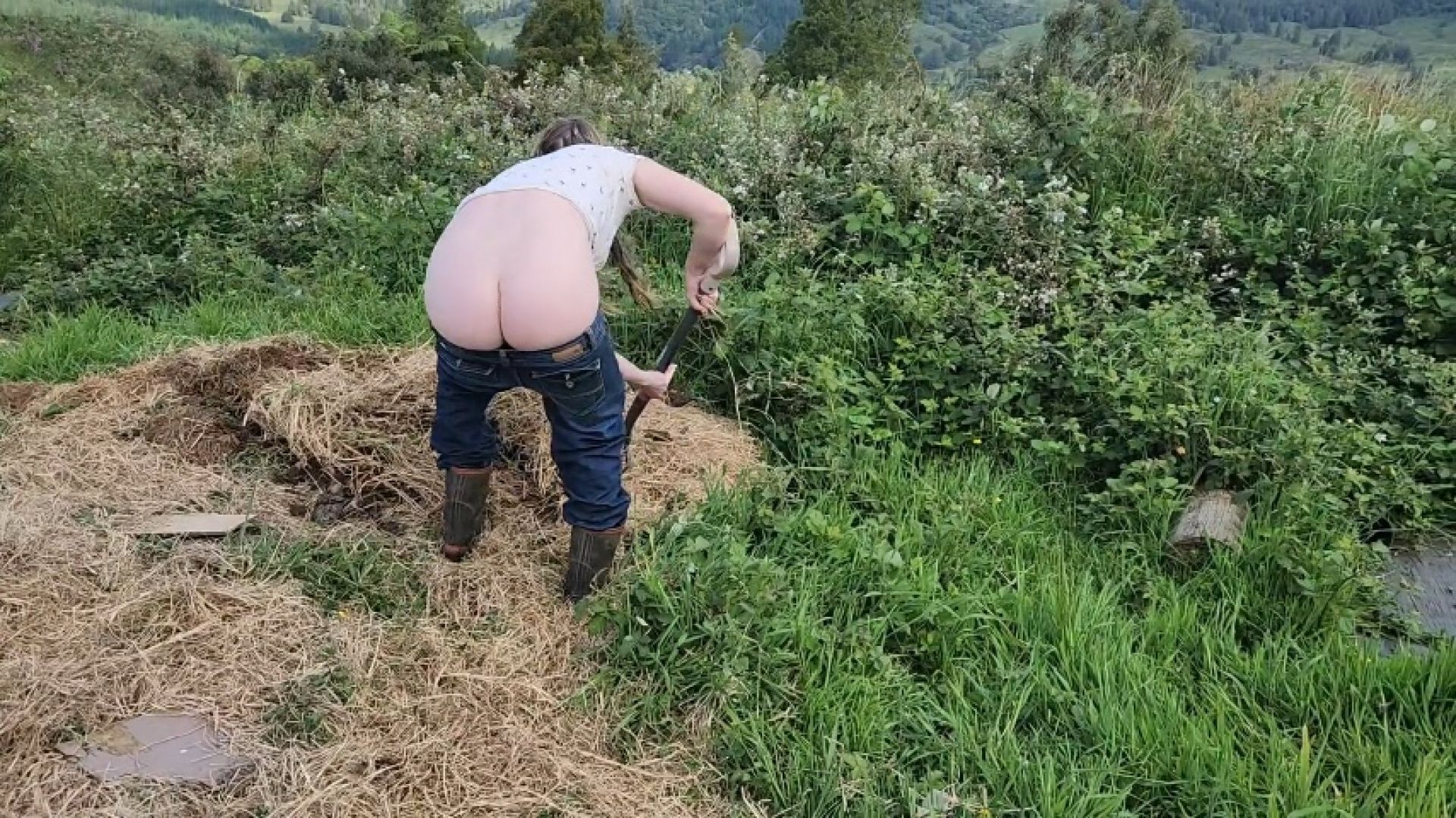 Working on farm with buttcrack showing
