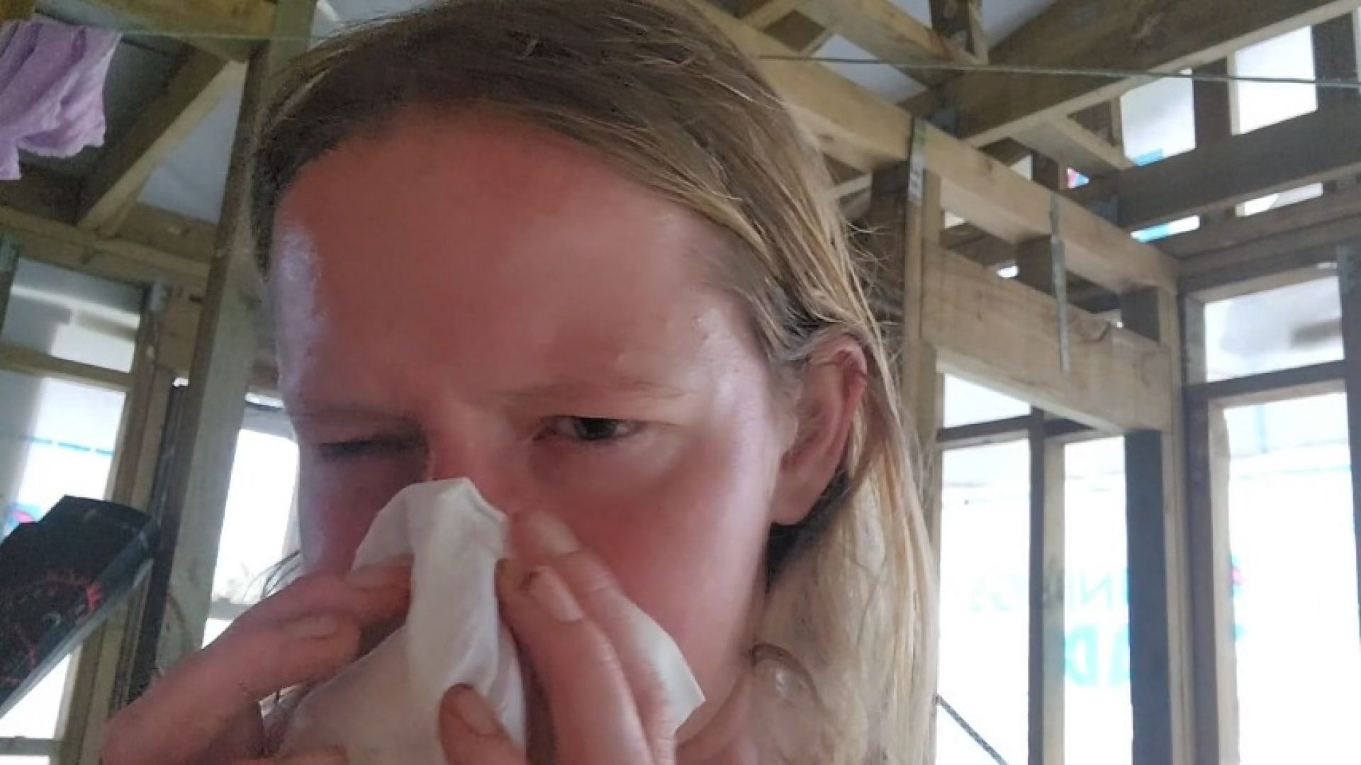 Girl blowing nose like a fog horn