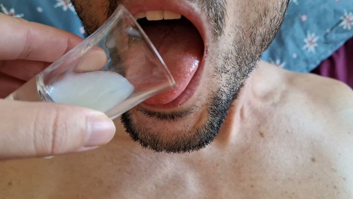 Bound slave boy swallows his own cum from a shot glass