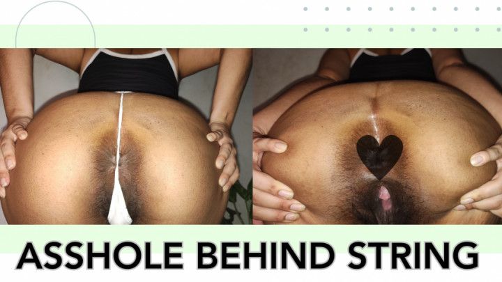 Asshole winking behind g-string