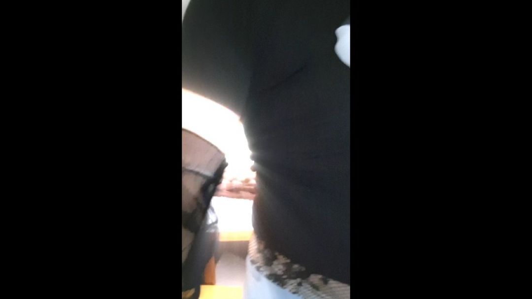 in a black top and tights