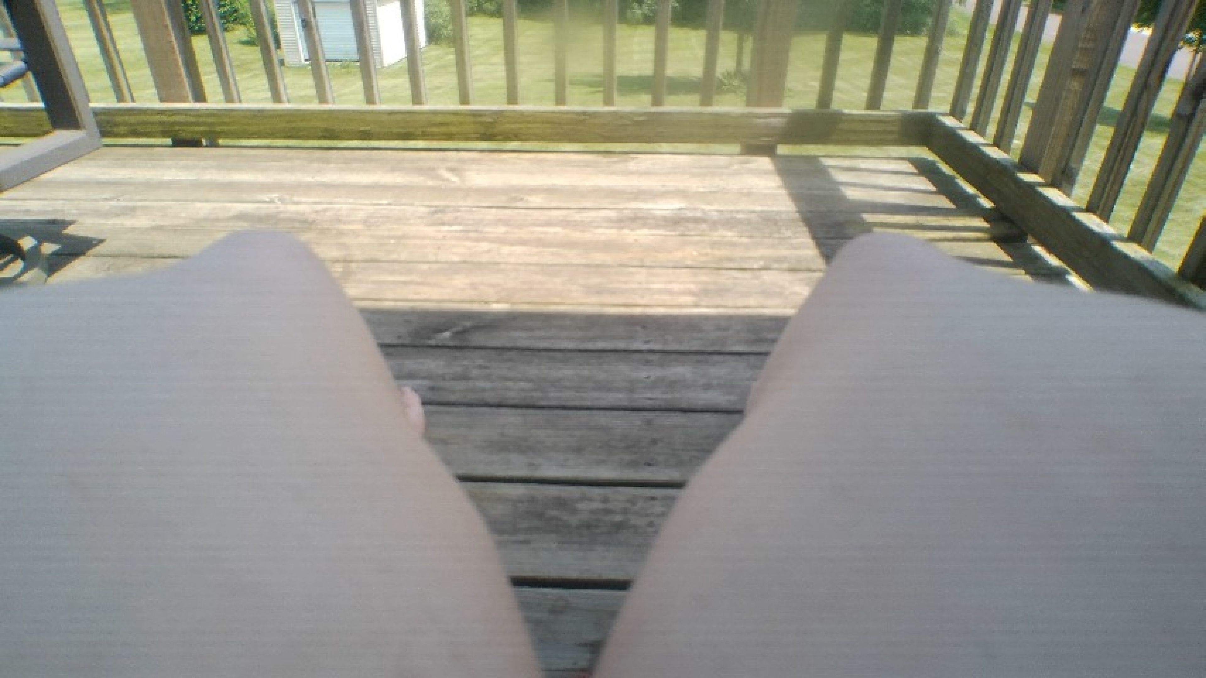 7-25-25  Bare feet and legs on deck