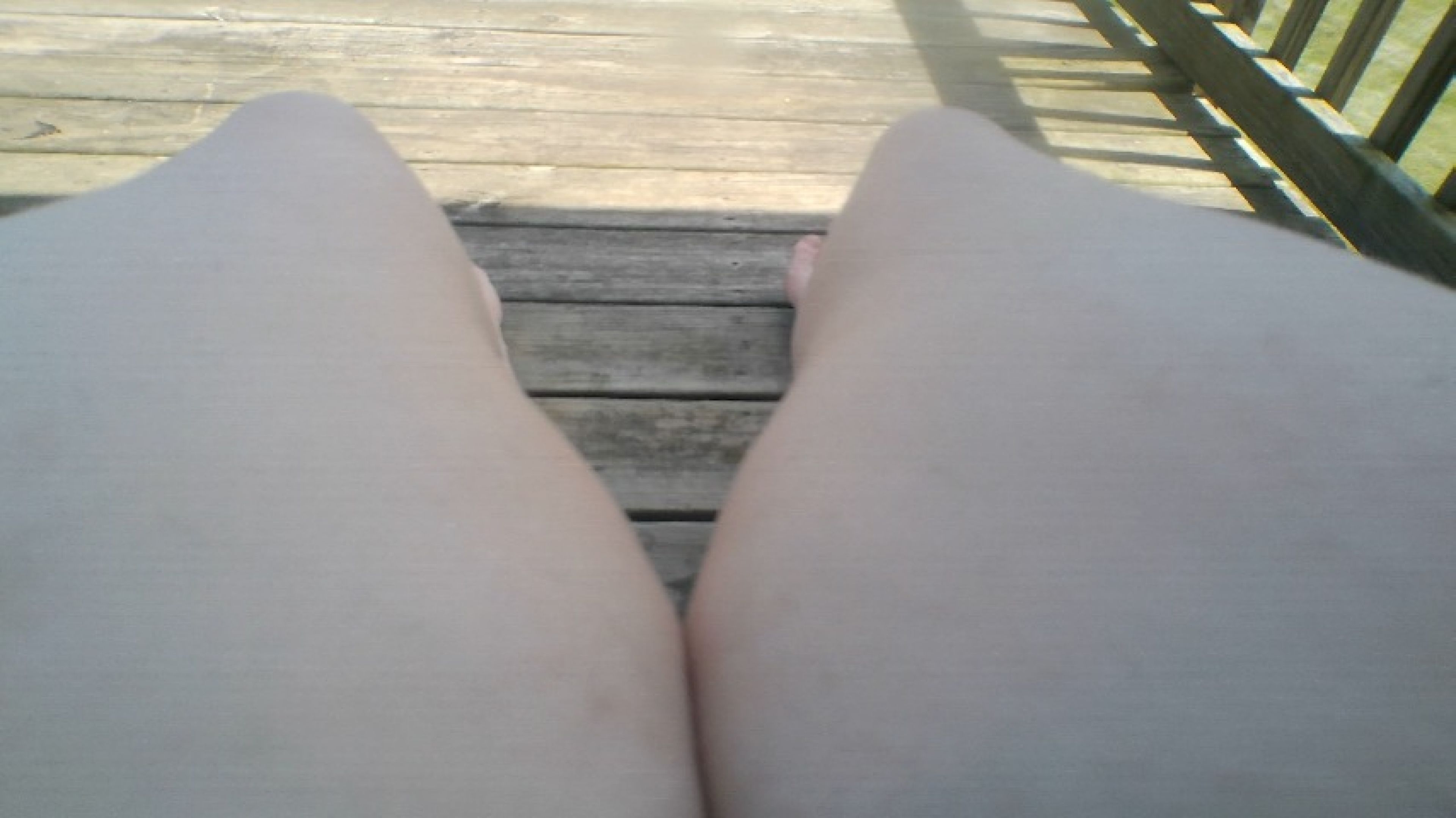 7-25-25  Bare feet facing yard