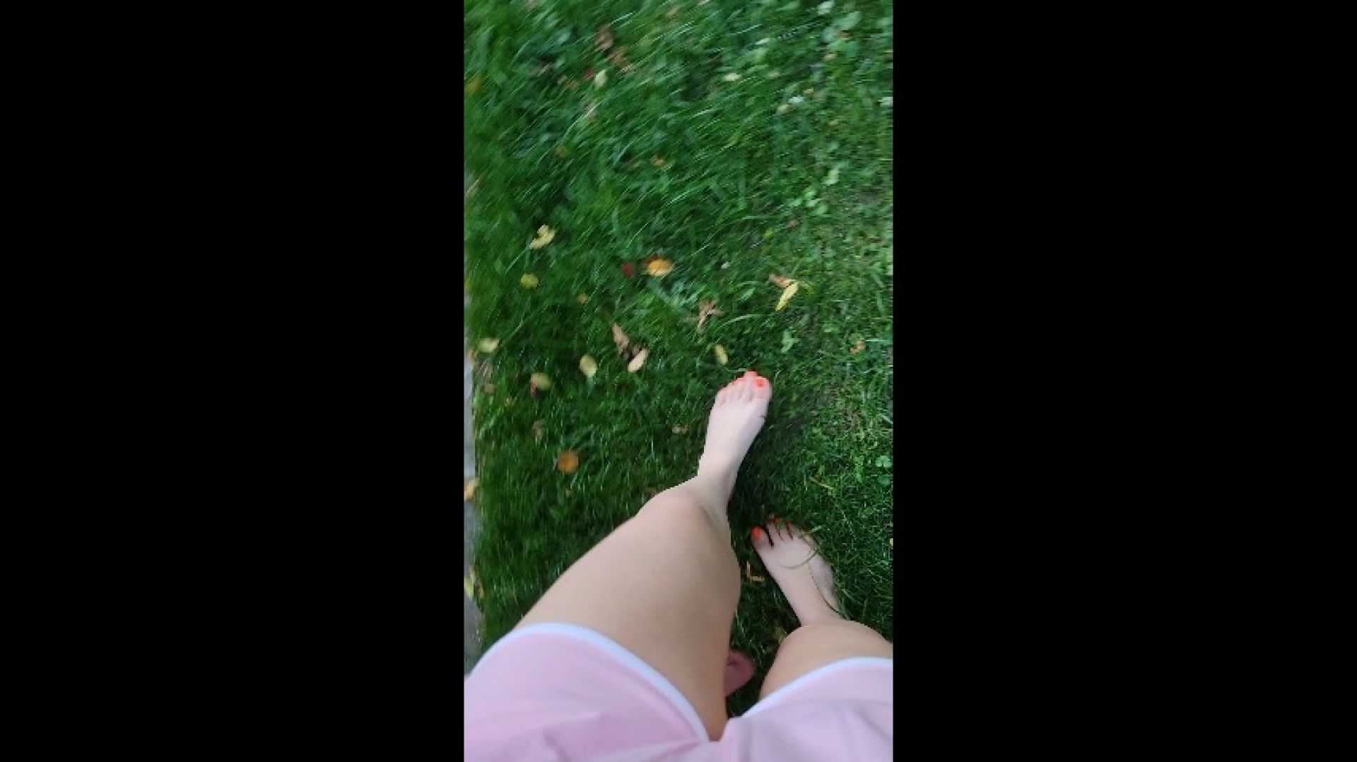 Bare foot walking on grass