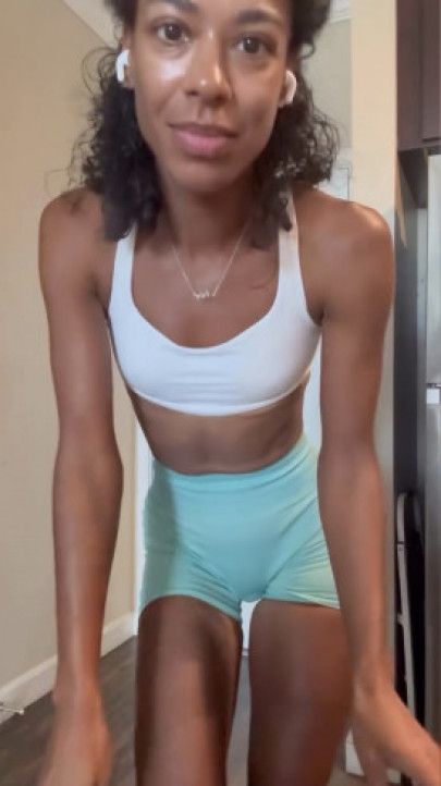 Dancing in my kitchen in workout clothes