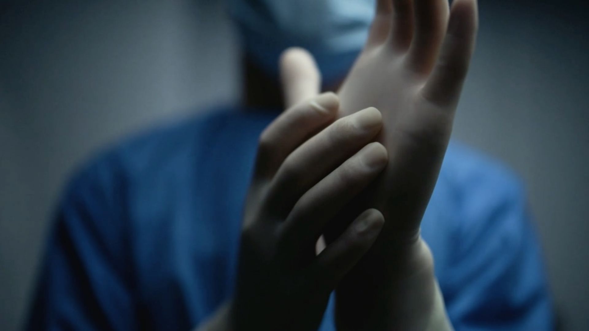 Wearing Surgical Gloves with Gown