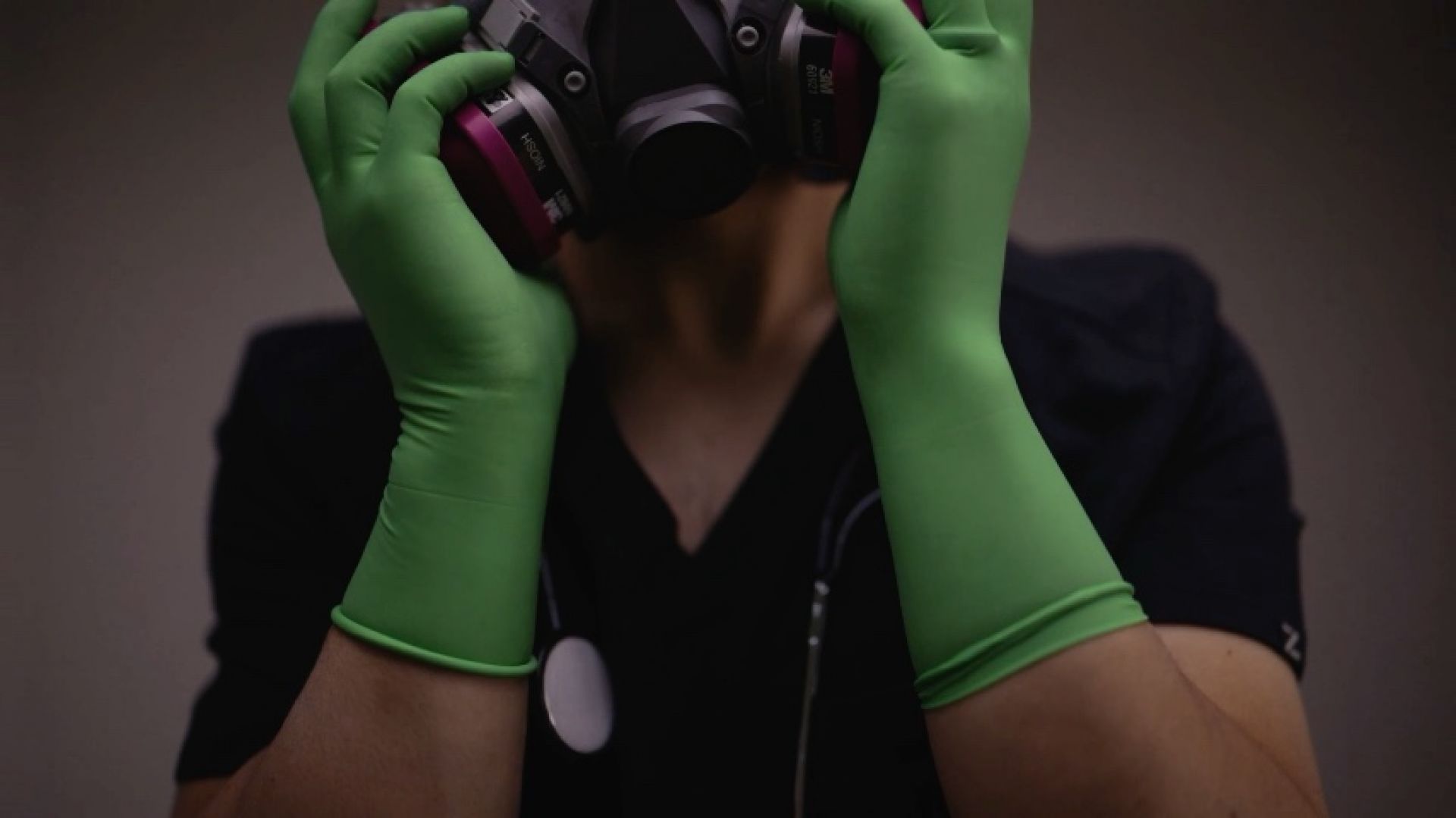 Green Surgical Gloves and Double Masked