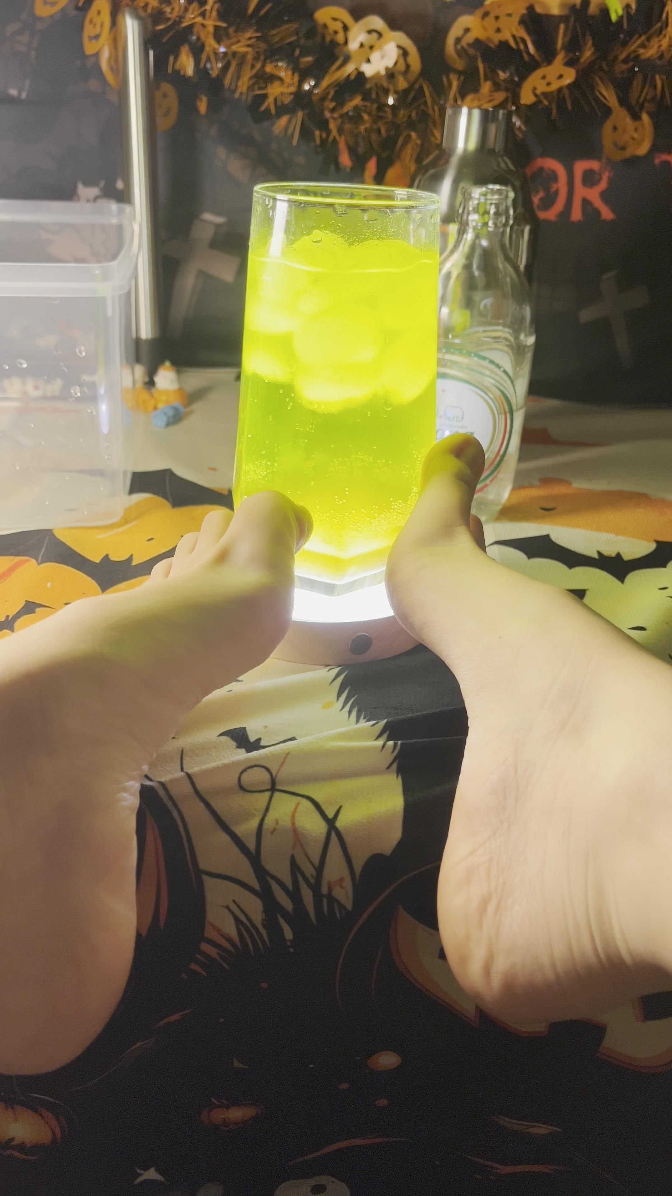 Halloween atmosphere and cocktails and feet