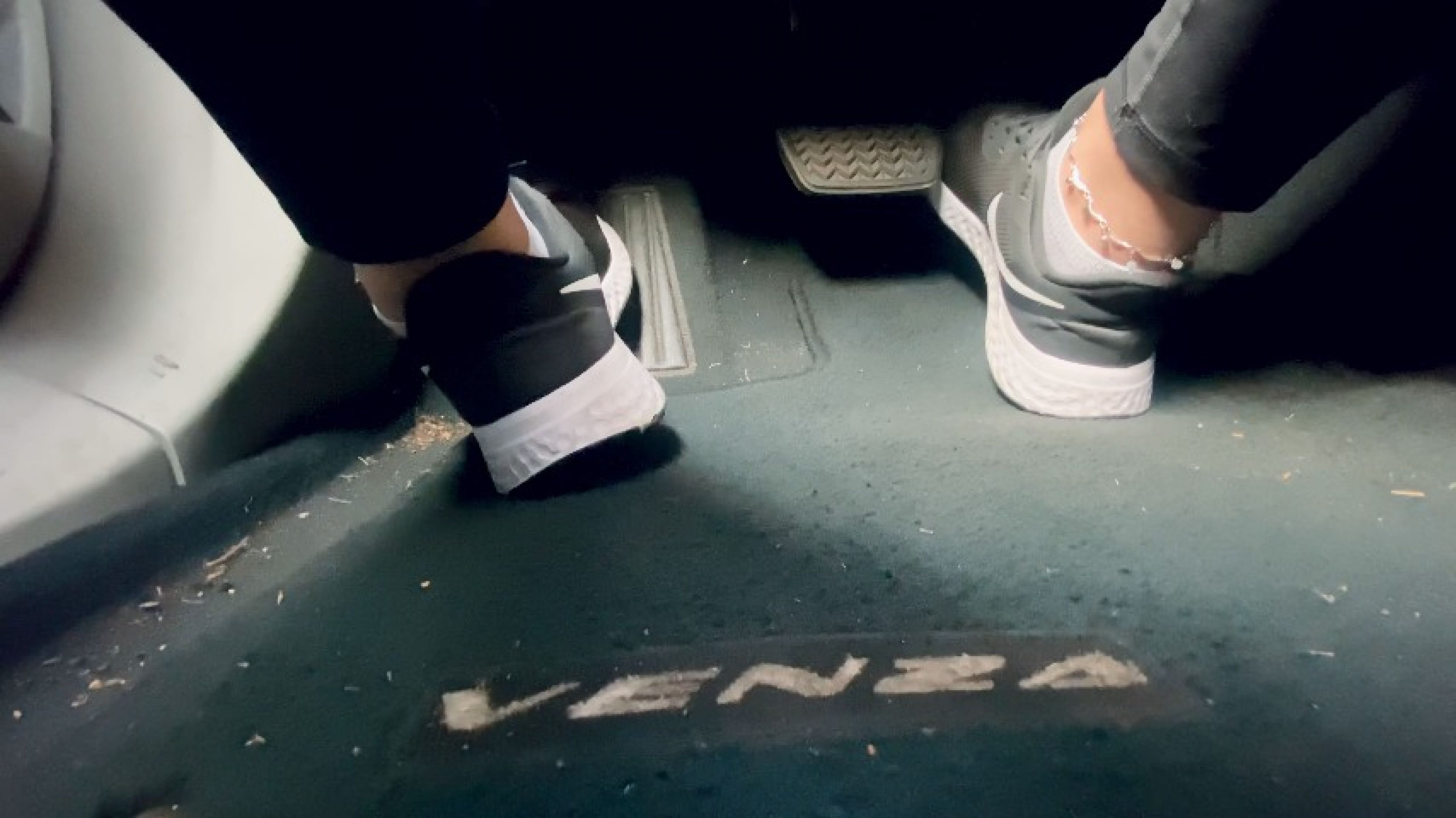 Driving in Black Nike's Sneakers