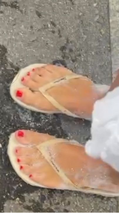Young Woman Flip-Flops in Foam