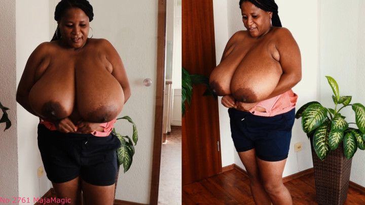 Pam's Giant Boobs in a Purple Top and Pink Satin Bra