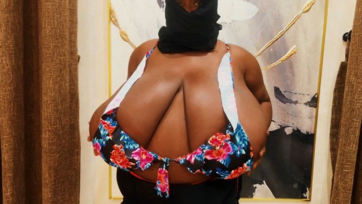 Angela tries on a too small Flower Bikini Top