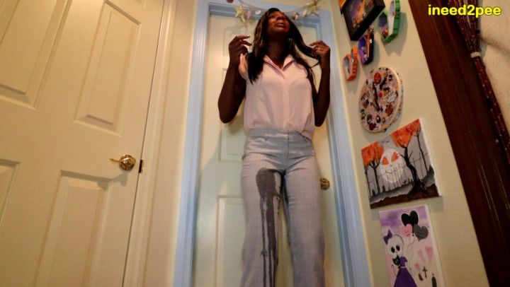 Paris Luv outside the bathroom wetting dress pants