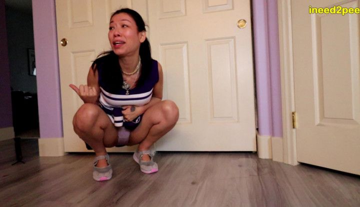 new model Cheerleader Miss Mia pissing her panties
