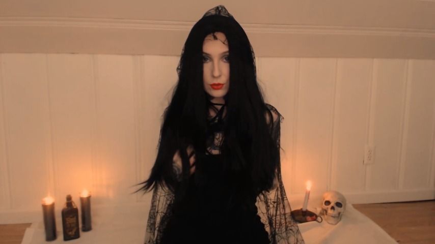 Morticia Sensual Strip and Wax Play