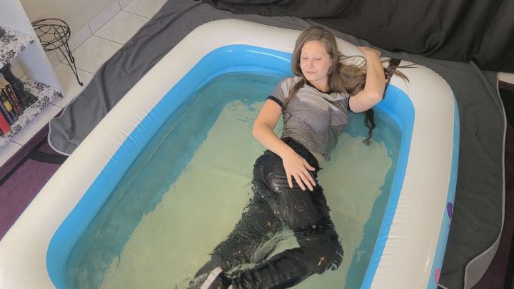 Jeans and Nikes in an inflatable P00L