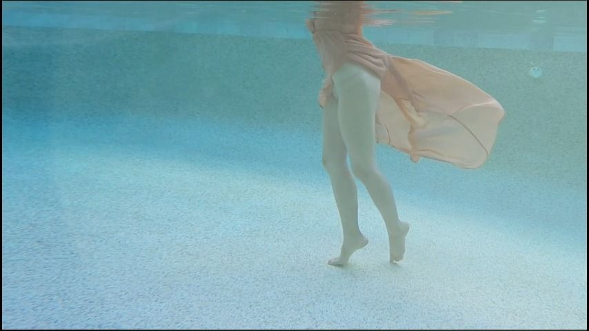 underwater voyeur in a flowy dress